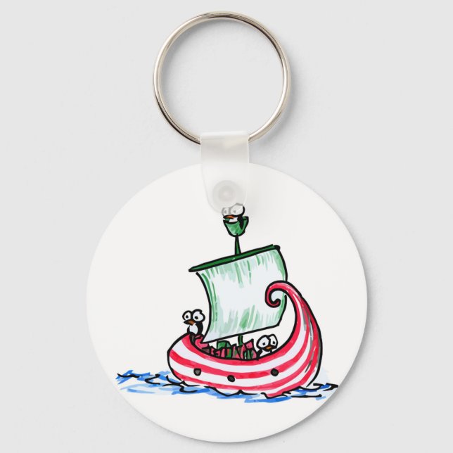 Penguins Sailing in a Christmas Boat Keychain (Front)