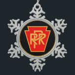 Pennsylvania Railroad Logo, Black & Gold Snowflake Pewter Christmas Ornament<br><div class="desc">From www.railphotoexpress.biz The Pennsylvania Railroad was the largest railroad by traffic and revenue in the US throughout its 20th-century existence and was at one time the largest publicly traded corporation in the world. At its peak, it controlled about 10, 000 miles (16, 000 km) of rail line. During its history,...</div>