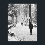 People at park in snowy winter day canvas print<br><div class="desc">People walk at park in a winter day in Istanbul. It snows heavily. Beauty of nature and people in winter concept.</div>