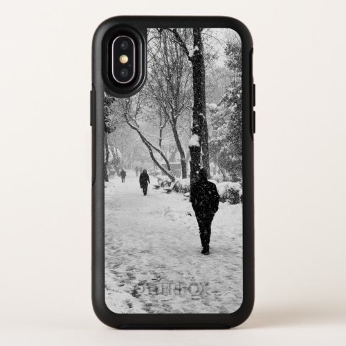 People at park in snowy winter day OtterBox symmetry iPhone x case