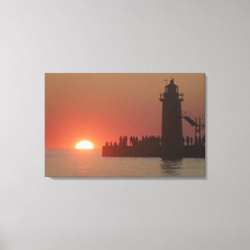 People lighthouse sunset silhouette at South Canvas Print