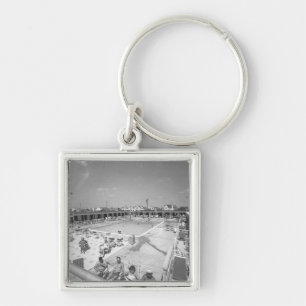 People relaxing at outdoor swimming pool B&W Keychain