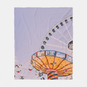 People riding on yoyo ride at daytime fleece blanket