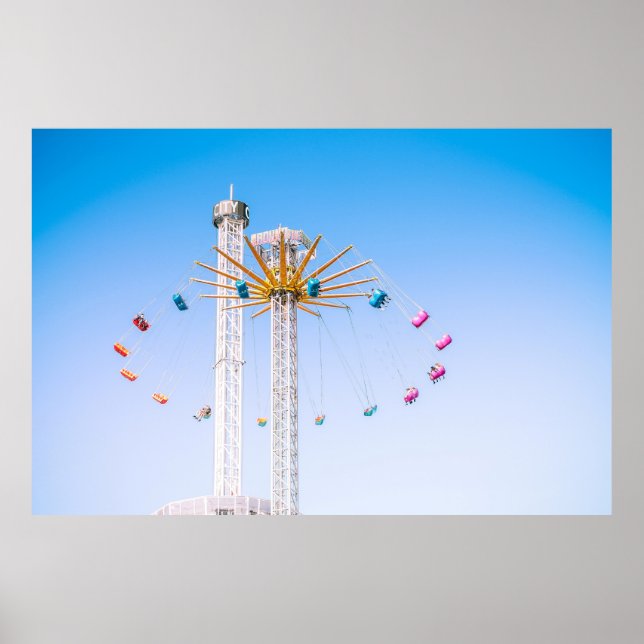 People riding swing amusement ride low-angle photo poster (Front)