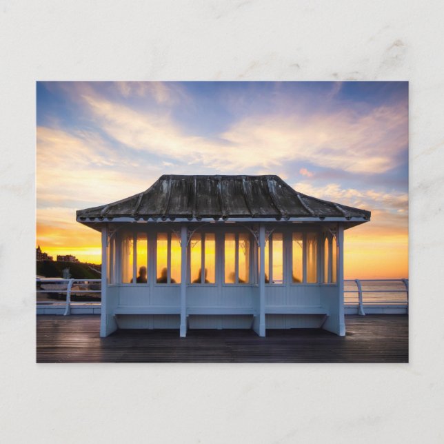 People watching sunset on Cromer pier in Norfolk Postcard (Front)