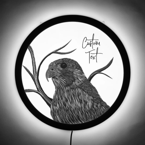 Peregrine Falcon in Tree Branches with Handwriting LED Sign
