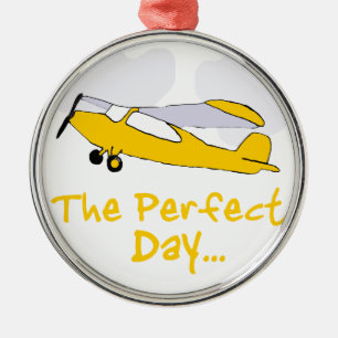 Perfect day flying airplane metal ornament
