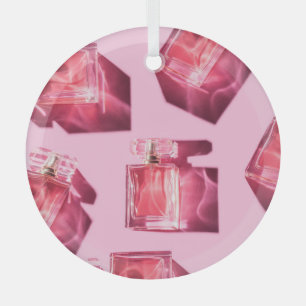 Perfume bottles, pink background, flatlay glass ornament