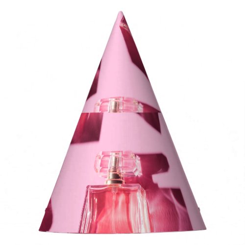 Perfume bottles pink background flatlay party hat