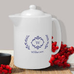 Periwinkle Elegant Monogram Name Modern Wreath Teapot<br><div class="desc">Personalize your kitchen with our elegant monogrammed name and initial periwinkle blue & white design featuring a unique laurel wreath and custom text option. All colors in this design including the wreath image may be changed to any color of your choice with the Zazzle design tool. Special vector graphic design...</div>