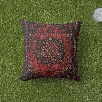 Persian carpet look in rose tinted field outdoor pillow