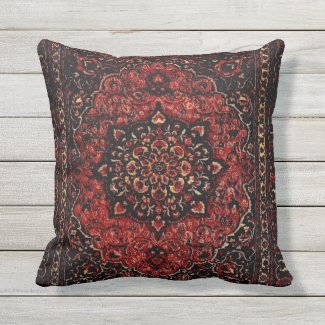 Persian carpet look in rose tinted field outdoor pillow