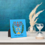 Persian Magen David Menorah Plaque<br><div class="desc">This image was adapted from an antique Persian Jewish tile and features a menorah with a Magen David (Star of David) framed by olive branches.  The imperfections of the original,  hand-painted image have been preserved. Add your own text and you may change the background color.</div>