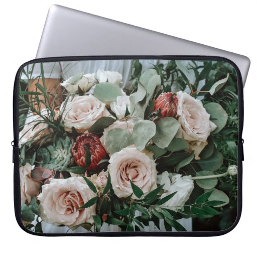 PERSON HOLDING BOUQUET OF PINK AND RED FLOWERS LAPTOP SLEEVE