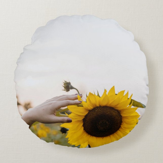 Person holding sunflower round pillow (Front)