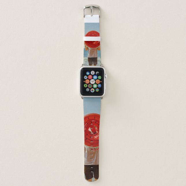 Person holding watermelon-themed inflatable ring apple watch band (Front)