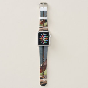 Person on brown swing apple watch band