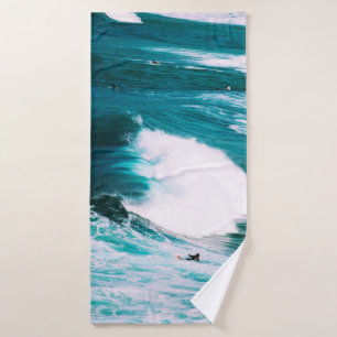 Person on surfboard with ocean waves bath towel