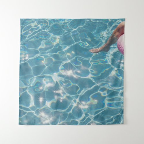 Person on swimming pool tapestry