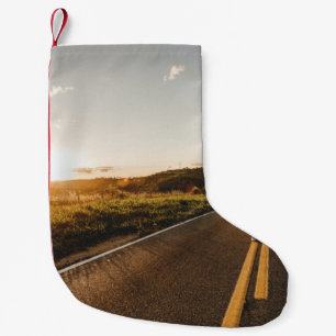 Person running in road in the morning small christmas stocking