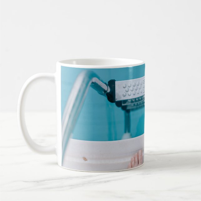 Person standing on swimming pool ladder coffee mug (Left)