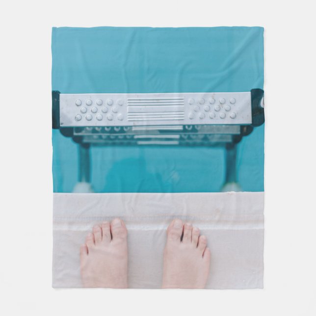 Person standing on swimming pool ladder fleece blanket (Front)