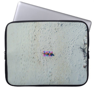 Person sunbathing at the beach laptop sleeve