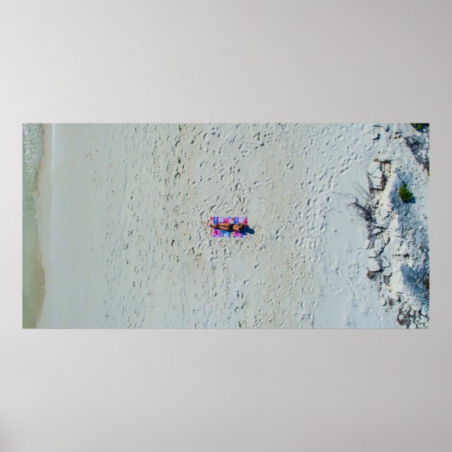 Person sunbathing at the beach poster (Front)