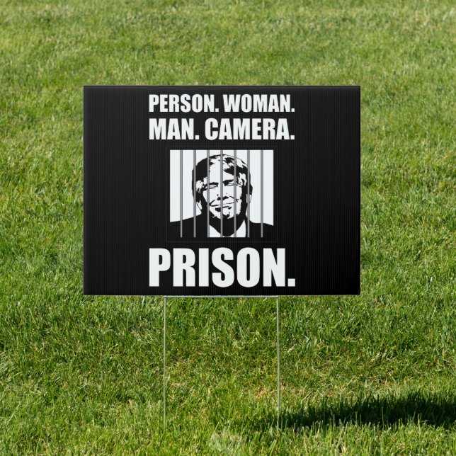 Person. Woman. Man. Camera. Prison. Sign (Insitu)