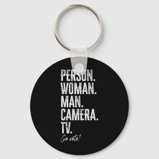 Person. Woman. Man. Camera. Tv. Go Vote Anti Trump Keychain
