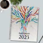 Personalized 2023 planner<br><div class="desc">This unique Planner is decorated with a brightly colored mosaic tree on a pale gray background. Easily customizable. To edit further use the Design Tool to change the font, font size, or color. Because we create our artwork you won't find this exact image from other designers. Original Mosaic © Michele...</div>