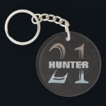 Personalized 21st Birthday | Number 21 Silver Keychain<br><div class="desc">Personalized 21st birthday gift for 21 year olds is this black and silver keychain- Bold, eye catching chrome 21 can't be missed. On a faux classy black leather look background. Name is centered in gray capital lettering with drop shadow effect. Same on both sides. Use on your 21st birthday to...</div>