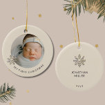 Personalized Baby Boy's First Christmas Ornament<br><div class="desc">Commemorate your baby boy's first Christmas with our "Personalized Baby Boy's First Christmas Ornament." The front of this delightful ornament showcases an adorable photo of your little one, framed by a charming champagne gold snowflake on the left, along with customizable text below. The light border adds a sweet touch to...</div>