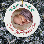 Personalized Baby First Christmas Photo Ceramic Ornament<br><div class="desc">Celebrate your little one's first Christmas with this charming personalized photo ornament. Add your own photo and change any of the text to customize. With pretty holly sprigs and modern script text in festive red, it beautifully showcases your favorite photograph of your baby, making it a perfect family keepsake. Hang...</div>