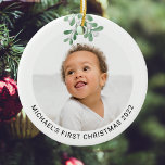 Personalized Baby's First Christmas Photo  Ceramic Ceramic Ornament<br><div class="desc">This modern First Christmas Ornament is decorated with watercolor mistletoe.
Easily customizable with your photo,  name,  and year.
Use the Design Tool to change the text size,  style,  or color.
Because we create our artwork you won't find this exact image from other designers.
Original Watercolor © Michele Davies.</div>