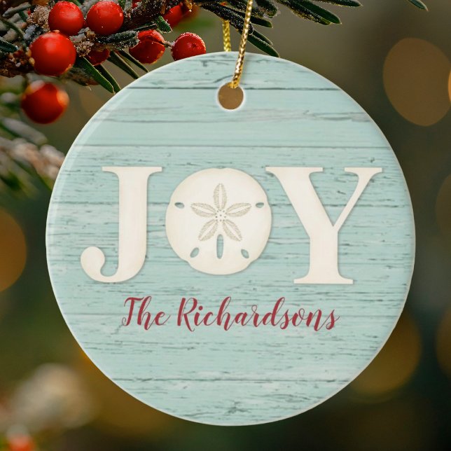 Personalized Beach Sand Dollar Christmas Joy Ceramic Ornament (A rustic tropical beach themed Christmas. ornament with the word JOY and a sand dollar.)