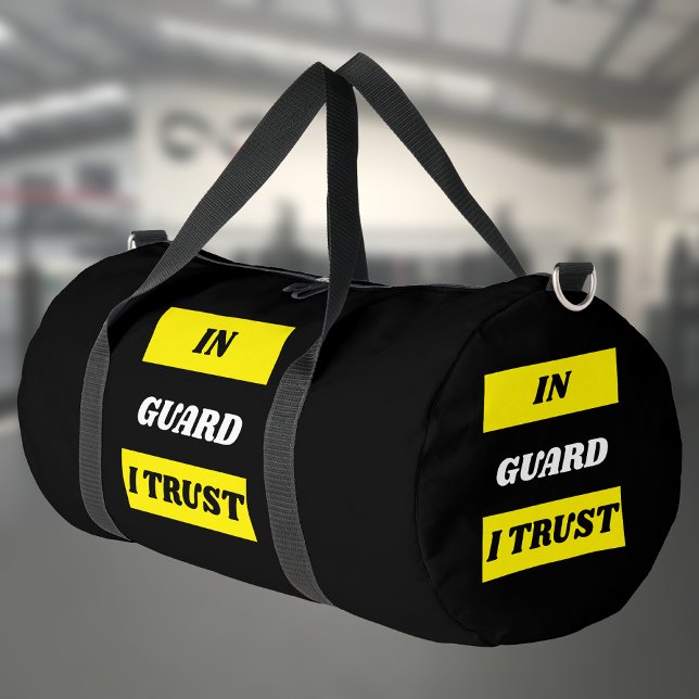 Personalized BJJ In Guard I Trust Jiu Jitsu Duffle Bag (In Guard I trust bag against a gym background.)