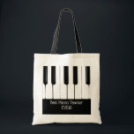 Personalized Black and White Piano Keys Tote Bag<br><div class="desc">Photograph of black and white piano keys with customizable text "Best Piano Teacher Ever!" below on black background.</div>