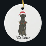 Personalized Black Great Dane Christmas Ceramic Ornament<br><div class="desc">Make the nice list this year with a personalized Christmas ornament of your favorite little black great dane elf in a santa hat and red and green holly wreath! For the sweetest gifts,  pair it with a matching art print or another item from my black great dane collection!</div>