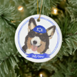Personalized Black Headed Tricolor Corgi Hanukkah Ceramic Ornament<br><div class="desc">Celebrate your favorite mensch on a bench with personalized ornament! This design features a sweet illustration of a black headed tricolor corgi dog with a blue and white yarmulke. For the most thoughtful gifts, pair it with another item from my collection! To see more work and learn about this artist,...</div>