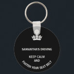 Personalized black Keep Calm girly driving Keychain<br><div class="desc">A fun gift for women drivers. In a black the words,  keep calm and fasten your seats are funny. Personalize this with a friend's name. Great for new drivers or those who drive faster than they should.</div>
