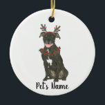 Personalized Black Pitbull Staffy Antlers Wreath Ceramic Ornament<br><div class="desc">Make the nice list this year with an ornament of your favorite pitbull elf! For the sweetest gifts, pair it with a matching art print or another item from my collection for a thoughtful housewarming, bridal shower, teacher, mother-in-law, husband, boyfriend, secret santa, sympathy, or tough-to-shop-for gift! To see more work...</div>