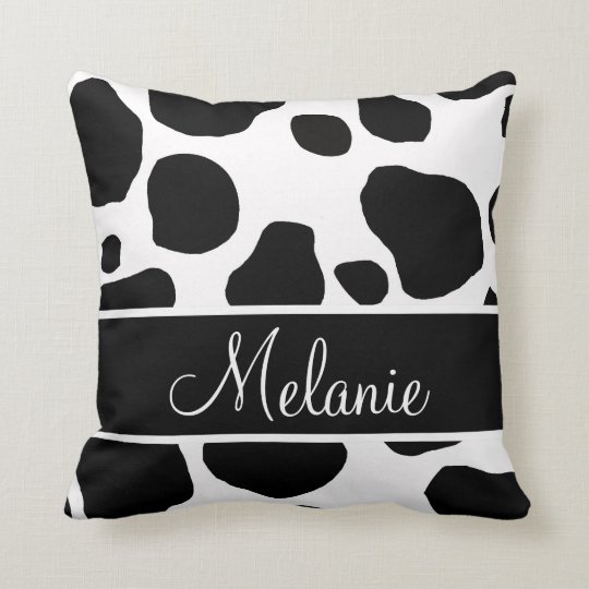 black and white cow print pillows