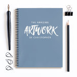 Personalized Blue Artist Sketchbook Notebook<br><div class="desc">A fun blue and white personalized sketchbook. The words, "The Amazing Artwork of" in a brush script font personalized with your name below. Customize the sketchbook with the name of your choice to make someone feel extra special. Makes a fun gift for birthdays or for Christmas. Comes in a variety...</div>