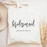 Personalized Bridesmaid Handwriting Script Tote Bag<br><div class="desc">This simple,  elegant tote bag features the word "bridesmaid" in charcoal gray handwriting script. Personalize it with her name in sans serif font. Makes a perfect bridesmaid gift!</div>