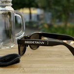 Personalized Bridesman Wedding Party Sunglasses<br><div class="desc">A pair of sunglasses is just what your Bridesman needs for the Bachelorette Party. Just add his name and your wedding date and call it done. Can be used for any member of your bridal party. Please note that the wedding date is small text, still readable but small</div>