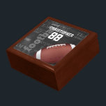 Personalized Chalkboard American Football Jewelry Box<br><div class="desc">A modern American football grid iron design featuring a football on a chalkboard typography background with football terminology in the background. The design features customizable text for the name and number of the football player or grid iron fan. This design has been made in part with graphics licensed by Graphics...</div>