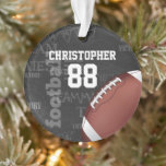 Personalized Chalkboard American Football Ornament<br><div class="desc">A modern American football grid iron design featuring a football on a chalkboard typography background with football terminology in the background. The design features customizable text for the name and number of the football player or grid iron fan. This design has been made in part with graphics licensed by Graphics...</div>