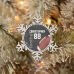 Personalized Chalkboard American Football Snowflake Pewter Christmas Ornament<br><div class="desc">A modern American football grid iron design featuring a football on a chalkboard typography background with football terminology in the background. The design features customizable text for the name and number of the football player or grid iron fan. This design has been made in part with graphics licensed by Graphics...</div>