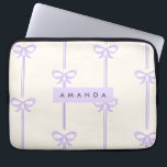 Personalized Coquette Pastel Lavender Bow Ribbon Laptop Sleeve<br><div class="desc">Our "Lavender Bow Ribbon" collection will take you to a world of refined sweetness. It will add a touch of elegance to your everyday items and favorite places. The delicate lavender bows on each piece in this collection are perfectly lined with flowing ribbons on a creamy pastel background. The look...</div>